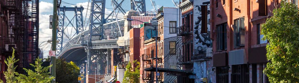 The Williamsburg Bridge with buildings in the foreground